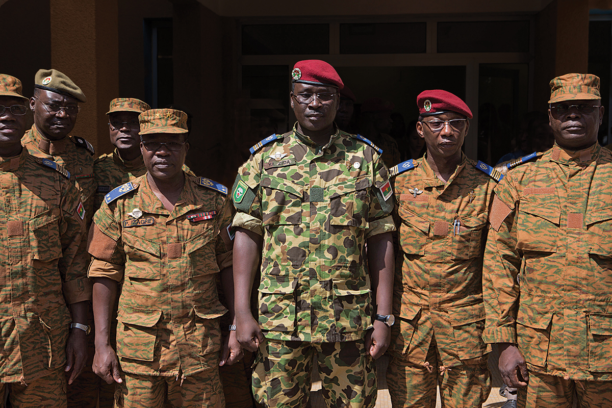 Lieutenant Colonel Isaac Zida poses for a picture after a news conference in which he was named president at military headquarters in Ouagadougou