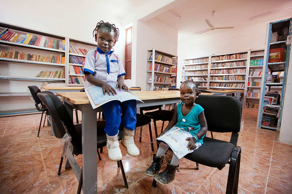 Two sisters read books